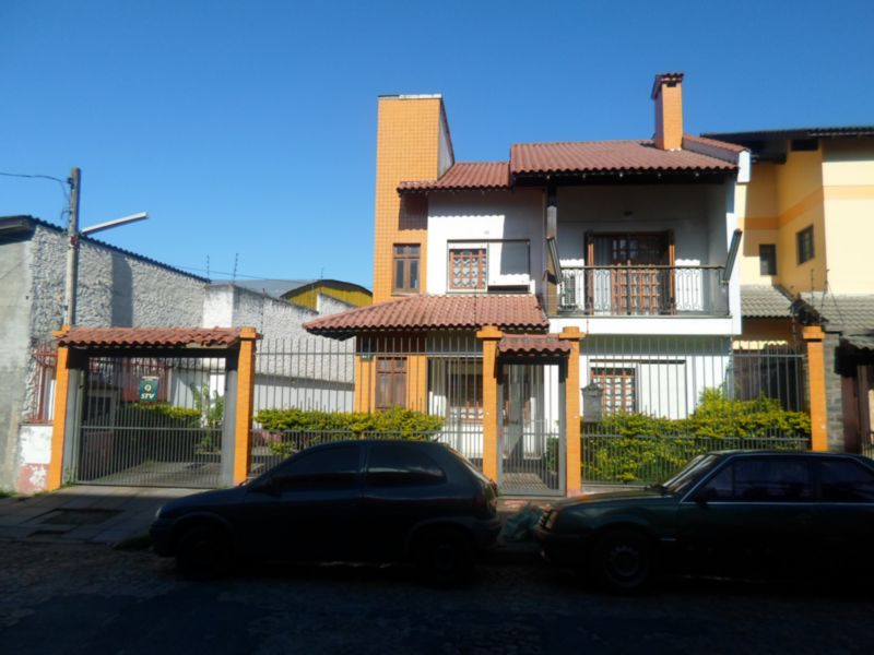 Casa com 400m², 6 dormitórios, 2 suítes, 5 vagas no bairro Santo Antonio em Porto Alegre para Comprar