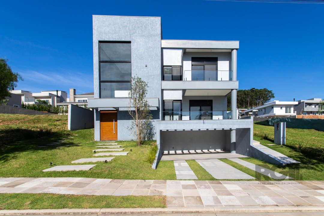 Casa Condominio com 371m², 4 dormitórios, 4 suítes, 4 vagas no bairro Alphaville em Porto Alegre para Comprar