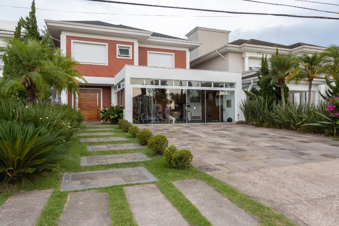 Casa Condominio com 395m², 3 dormitórios, 3 suítes, 2 vagas no bairro Belém Novo em Porto Alegre para Comprar