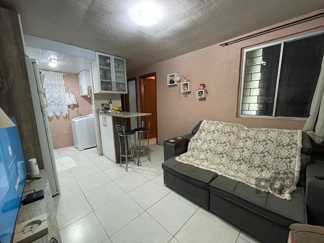 Apartamento com 39m², 2 dormitórios, 1 vaga no bairro Vila Nova em Porto Alegre para Comprar