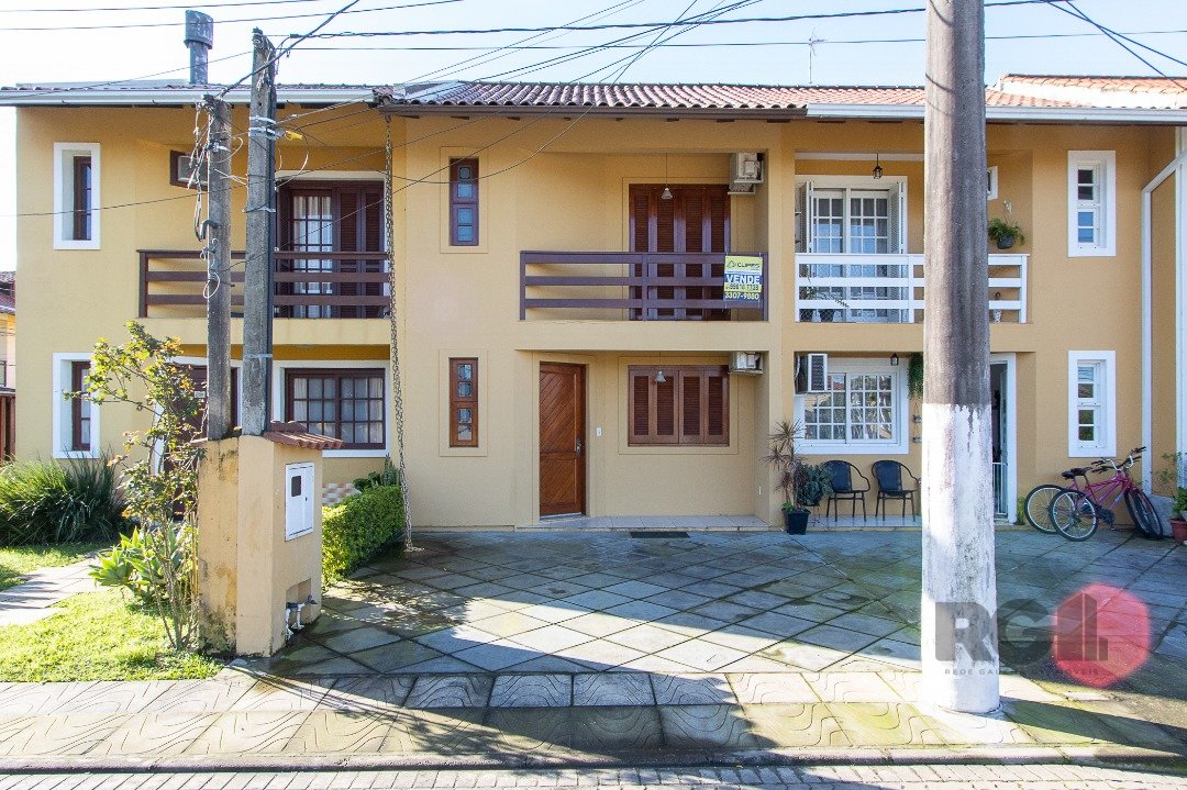 Casa Condominio com 95m², 2 dormitórios, 2 vagas no bairro Hípica em Porto Alegre para Comprar