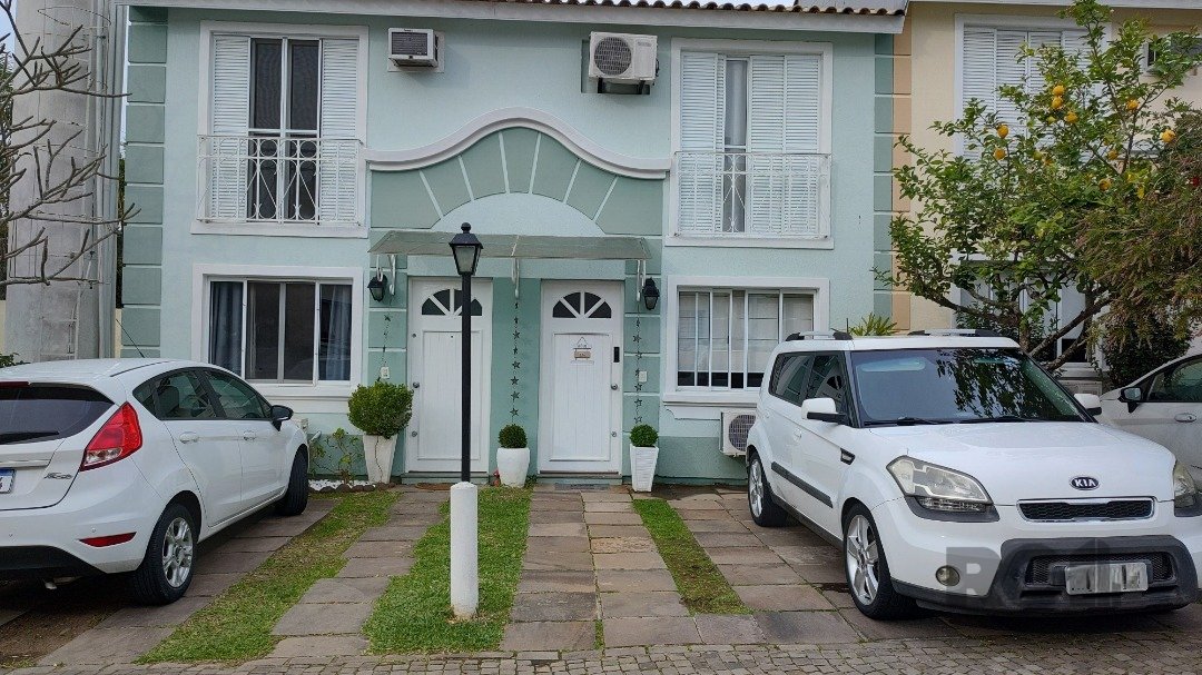Casa Condominio com 79m², 2 dormitórios, 1 suíte, 1 vaga no bairro Cavalhada em Porto Alegre para Comprar