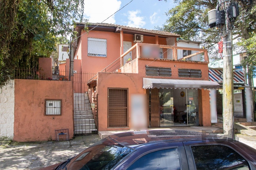 Casa com 90m², 2 dormitórios, 2 vagas no bairro Cristal em Porto Alegre para Comprar