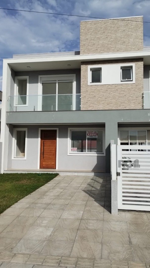 Casa com 100m², 3 dormitórios, 1 suíte, 2 vagas no bairro Jardim Beira Mar em Capão Da Canoa para Comprar