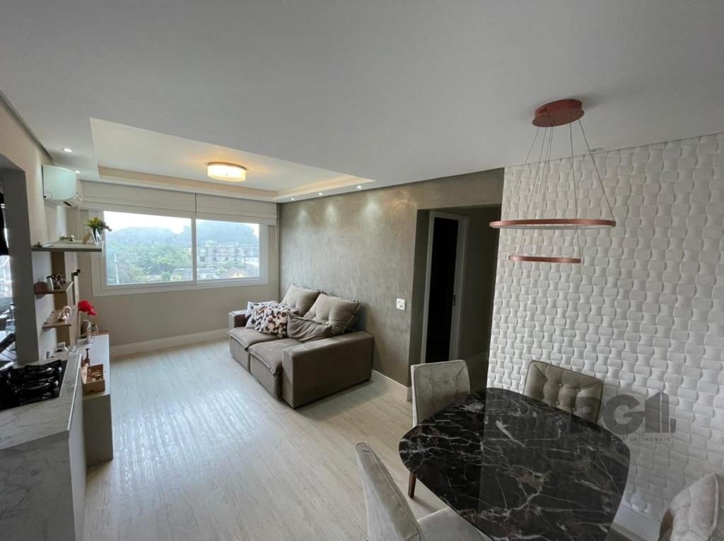 Apartamento com 60m², 2 dormitórios, 1 suíte, 1 vaga no bairro Glória em Porto Alegre para Comprar