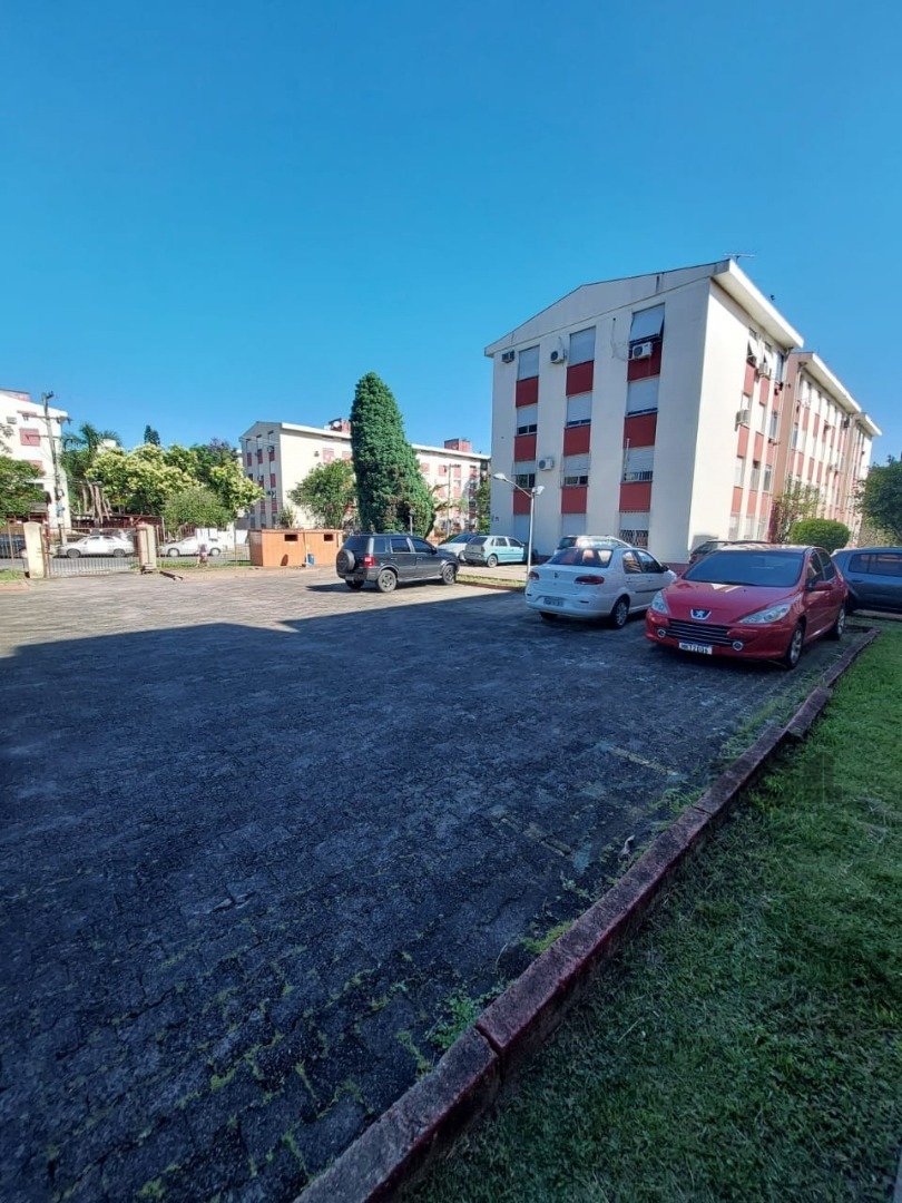 Apartamento com 59m², 3 dormitórios, 1 vaga no bairro Vila Nova em Porto Alegre para Comprar