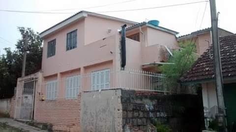 Casa com 65m², 4 dormitórios, 1 suíte, 1 vaga no bairro Jardim Carvalho em Porto Alegre para Comprar