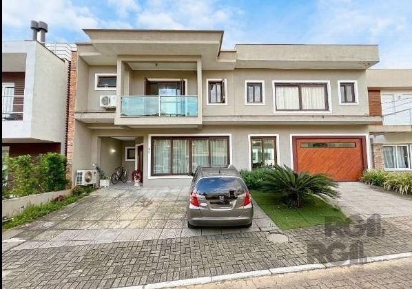 Casa Condominio com 315m², 3 dormitórios, 1 suíte, 3 vagas no bairro Hípica em Porto Alegre para Comprar