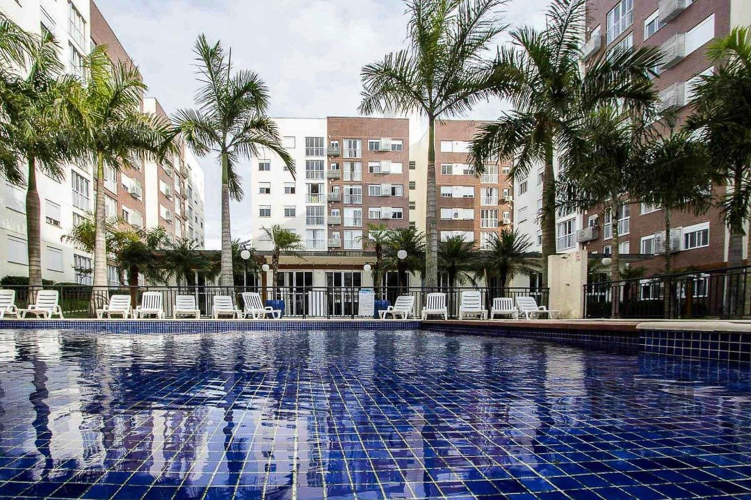 Apartamento com 57m², 2 dormitórios, 1 suíte, 1 vaga no bairro Vila Nova em Porto Alegre para Comprar