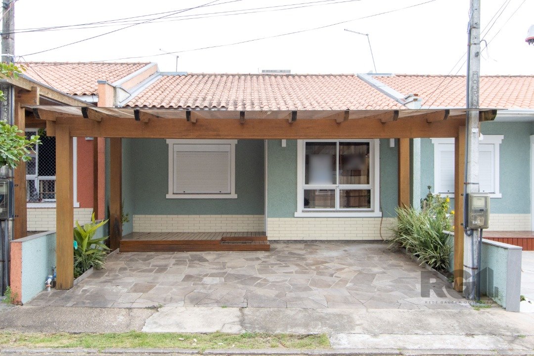 Casa Condominio com 71m², 3 dormitórios, 1 suíte, 2 vagas no bairro Hípica em Porto Alegre para Comprar