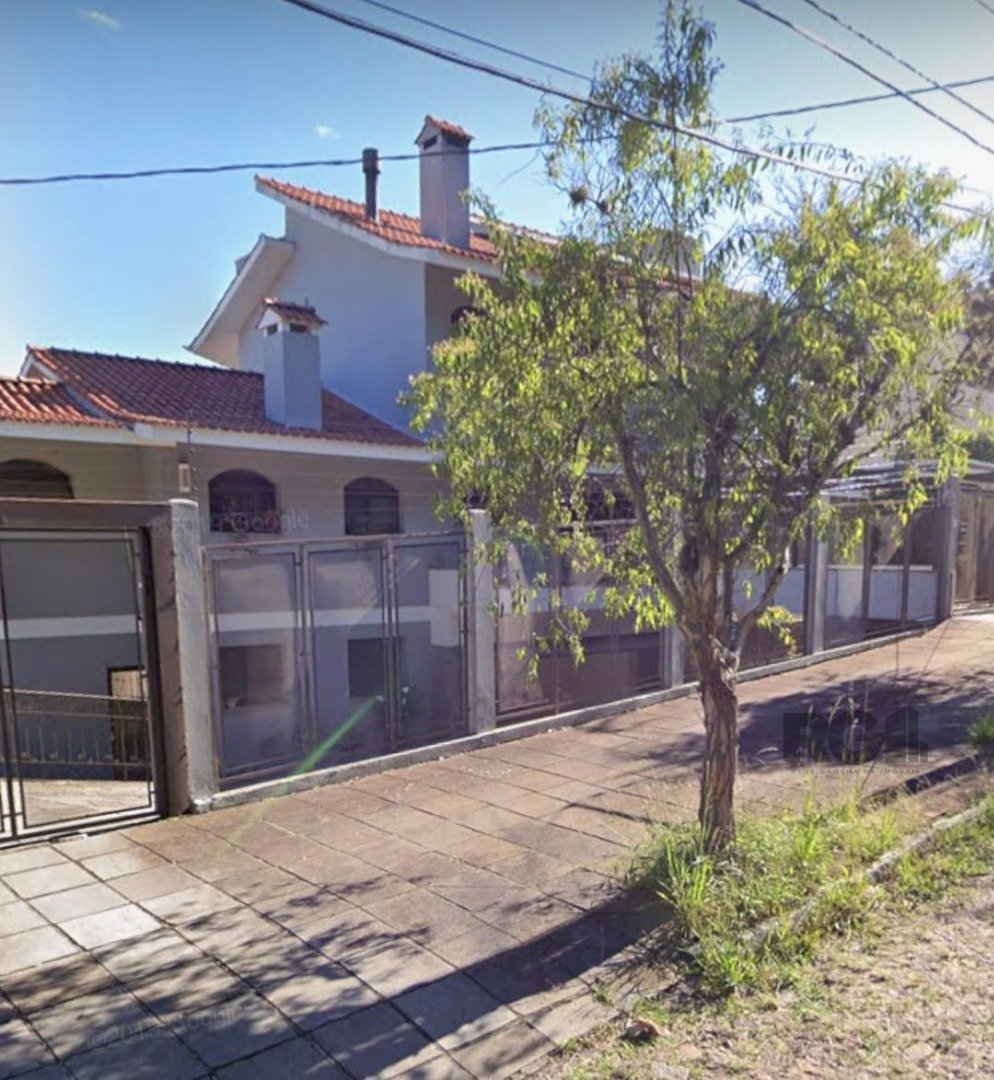 Casa com 648m², 5 dormitórios, 5 suítes, 7 vagas no bairro Sétimo Céu em Porto Alegre para Comprar