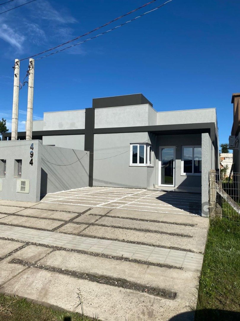 Casa com 92m², 2 dormitórios, 1 suíte, 2 vagas no bairro Jardim Beira-Mar em Capão da Canoa para Comprar