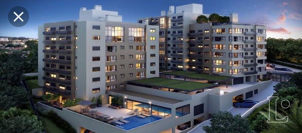 Apartamento com 103m², 3 dormitórios, 1 suíte, 2 vagas no bairro Menino Deus em Porto Alegre para Comprar