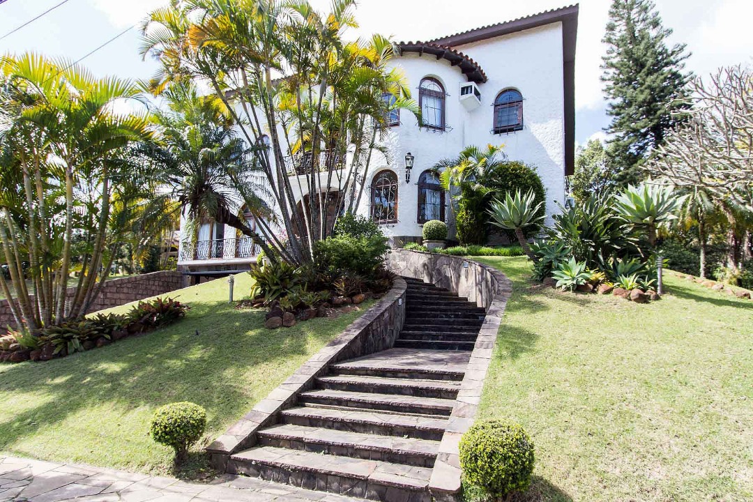 Casa Condominio com 552m², 3 dormitórios, 3 suítes, 4 vagas no bairro Cavalhada em Porto Alegre para Comprar
