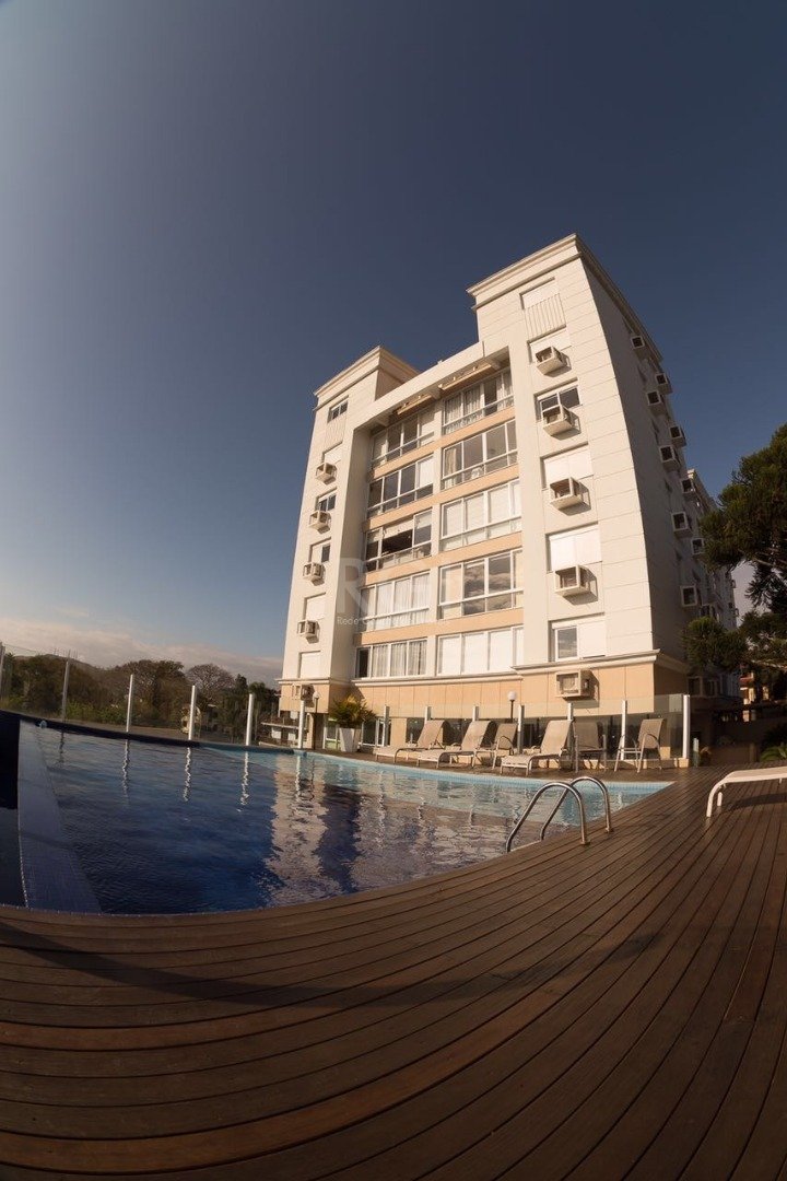 Apartamento com 80m², 3 dormitórios, 1 suíte, 2 vagas no bairro Menino Deus em Porto Alegre para Comprar