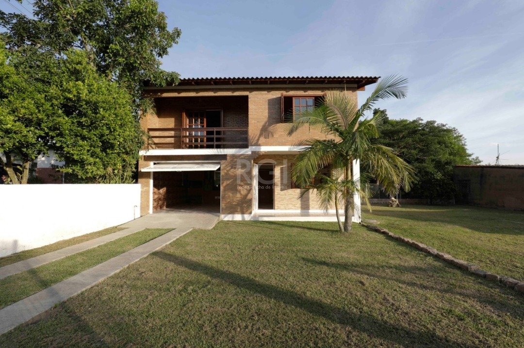 Casa com 160m², 2 dormitórios, 2 vagas no bairro Boa Vista do Sul em Porto Alegre para Comprar