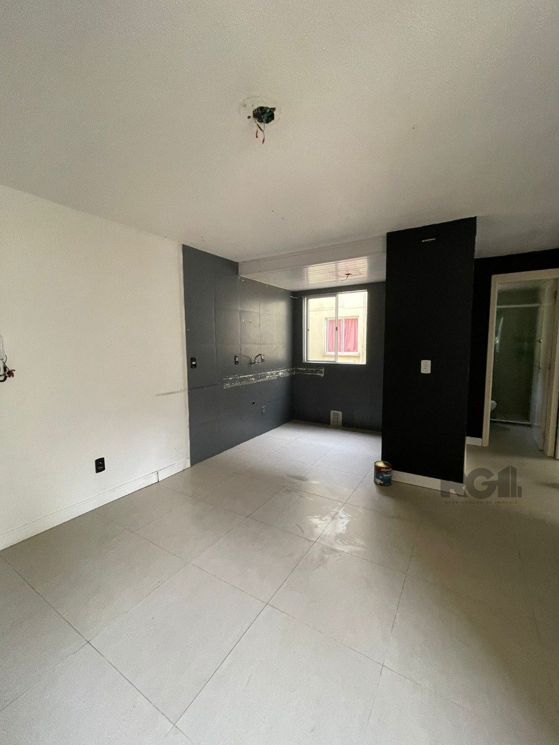 Apartamento com 43m², 2 dormitórios, 1 vaga no bairro Vila Nova em Porto Alegre para Comprar