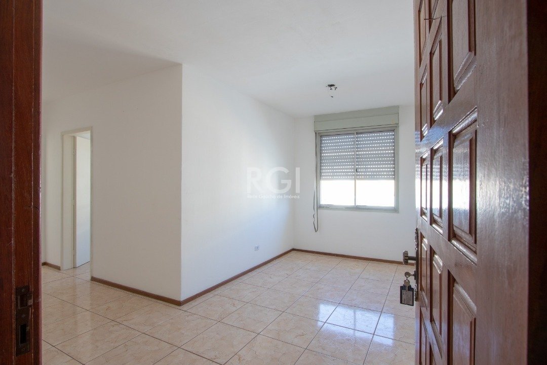 Apartamento com 52m², 2 dormitórios, 1 vaga no bairro Vila Nova em Porto Alegre para Comprar