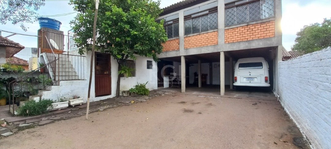 Casa à venda com 3 quartos, 100m² - Foto 1