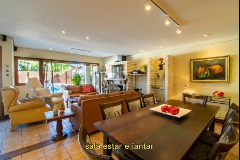 Casa com 280m², 4 dormitórios, 1 suíte, 3 vagas no bairro Jardim Isabel em Porto Alegre para Comprar